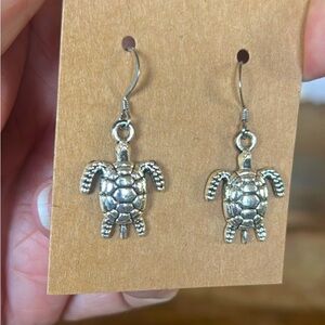Silver Tone Turtle Dangle Earrings.